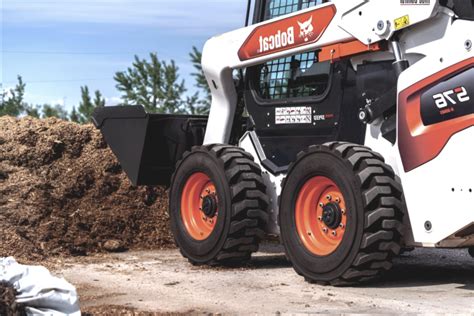 tracked or wheeled skid steer|best track vs wheel skid steer.